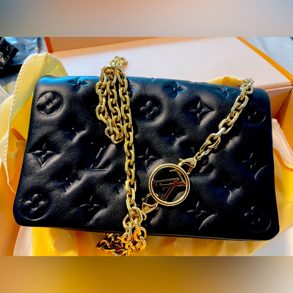 Louis Vuitton Coussin Pochette Monogram embossed lambskin bag
